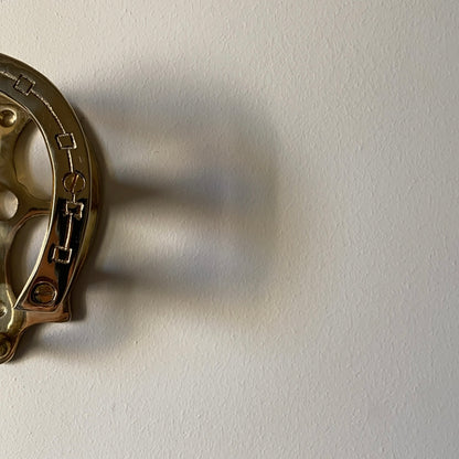 Horseshoe gold iron hanger