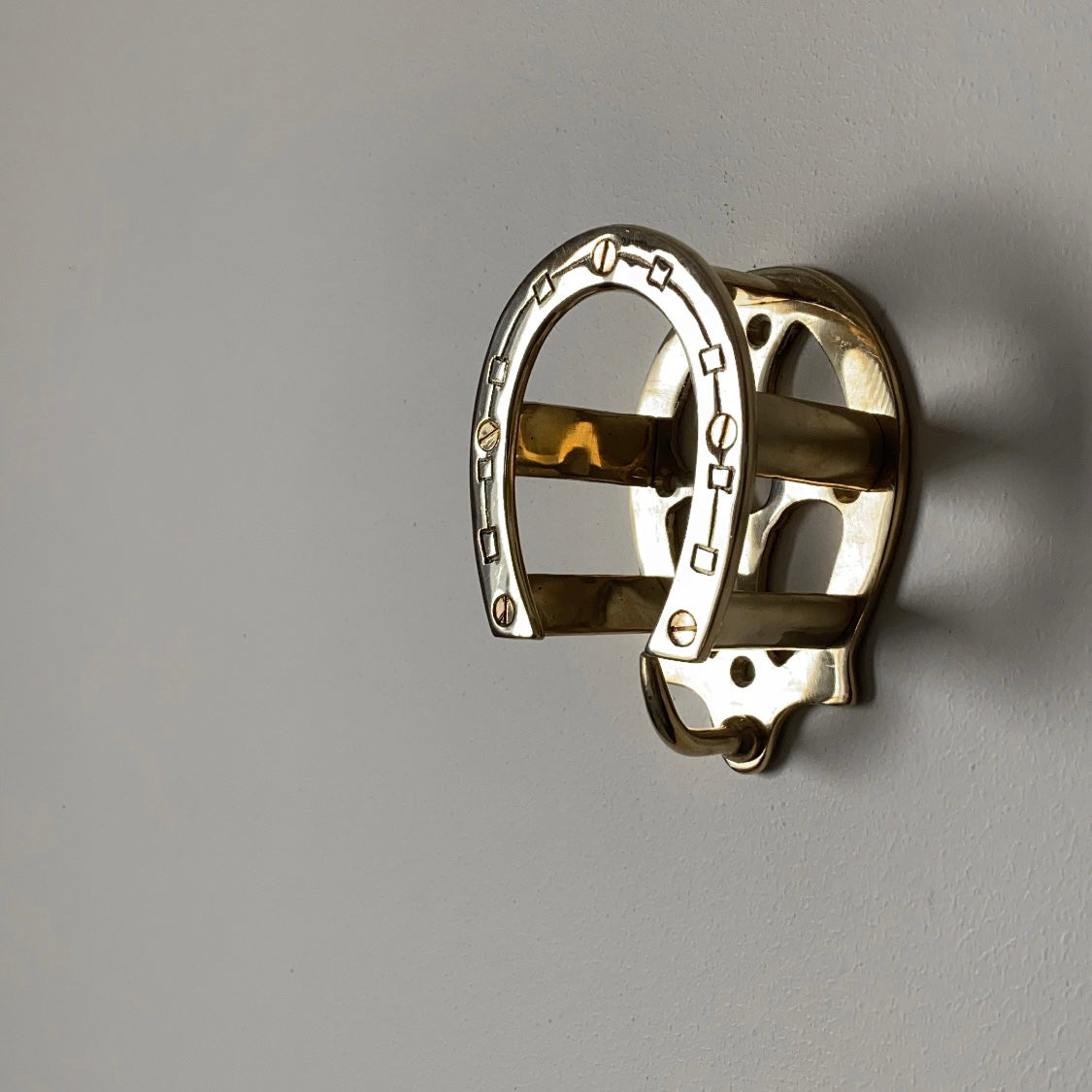 Horseshoe gold iron hanger